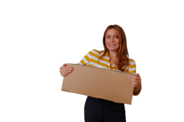 Woman smiling, holding a rectangular cardboard mailing box, delivering a package, isolated with transparent background
