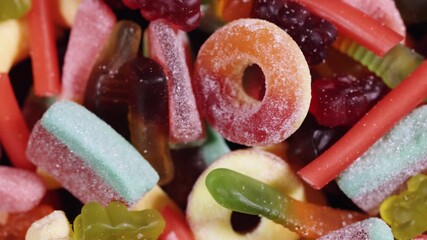 Tasty colorful jelly candies as background, above view. - Powered by Adobe