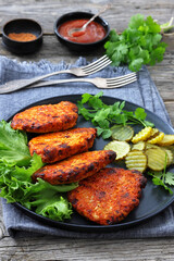 Paprika-Rubbed Pork Chops on a grey plate