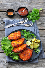 Paprika-Rubbed Pork Chops on a grey plate