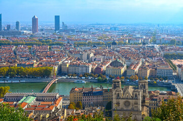 Obraz premium Panoramic view of Lyon with traditional architecture during sunny day in France