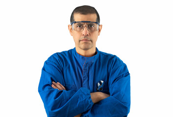 professional, construction or mechanic .Male worker or builder in and goggles with crossed arms over white background