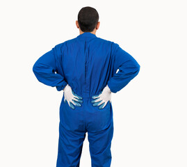 Rear view of unrecognizable mechanic man holding his lower back in discomfort due to pain with white background