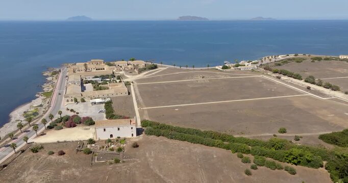Aerial view of the archaeological site of Lilibeo (Lilybaeum for the Romans), located near Marsala, Sicily, Italy. It was an ancient city towards Cape Boeo and in the background are the Egadi Islands.