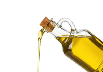 Isolated Extra Virgin Olive Oil pouring from a glass bottle against a clean background