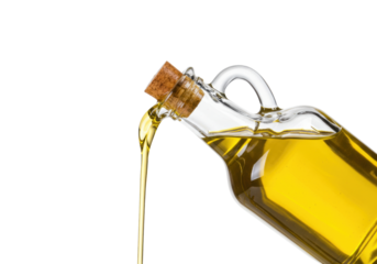 Isolated Extra Virgin Olive Oil pouring from a glass bottle against a clean background