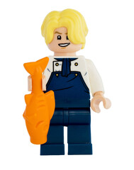 Obraz premium Dortmund - Deutschland 4. November 2025 - Lego Figur Sanji mit Latzhose blickt böse der Serie One Piece - Studio Aufnahme