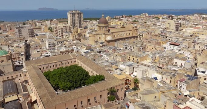Aerial view of Marsala Cathedral, in province of Trapani, Sicily, Italy. It is dedicated to the Anglo-Norman saint Thomas Becket. The Aegadian Islands are in the background. 