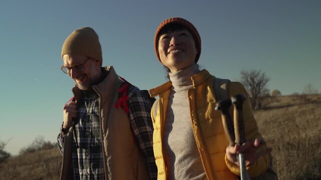Happy couple enjoying hiking adventure in nature