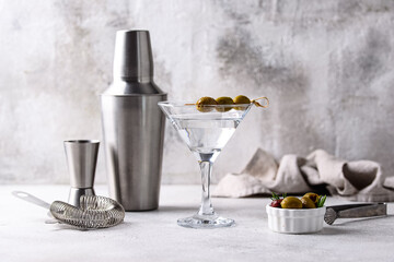 Traditional martini cocktail with olives and