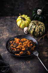 Halloween dish black pasta with bolognese