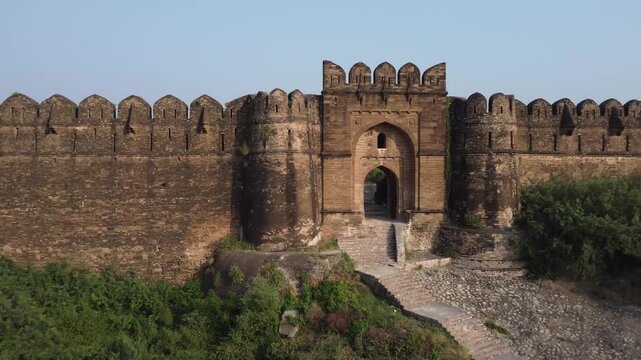 Front view showing Badshahi Gate of Rohtas Fort Pakistan with historic stone design and strong fort walls