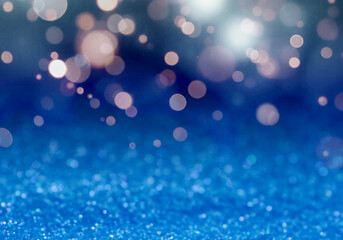 Fototapeta premium Christmas background with blue glitters and bokeh lights