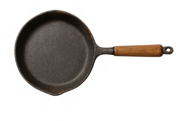 Vintage cast iron skillet with wooden handle, an isolated kitchen frying pan ready for cooking food and preparing meals