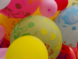 Colorful balloons with cartoon animal prints for celebration party yellow