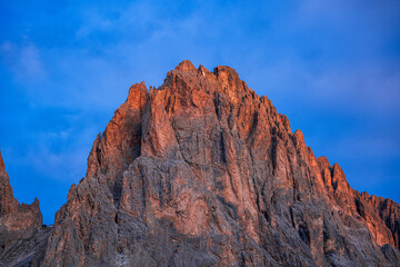 View of the Langkofel group in the morning light in Italy.