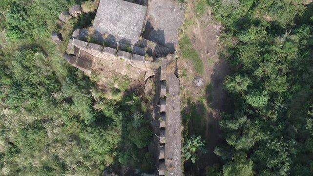 Tilt camera movement capturing ancient stone wall of Rohtas Fort built in Sher Shah Suri&rsquo;s defensive design