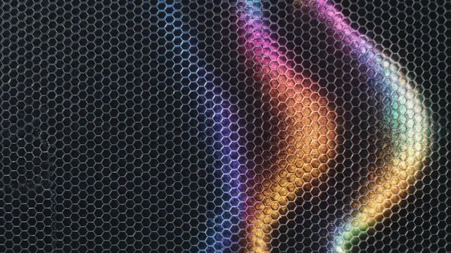 Waves of colorful light flow gracefully across a textured surface, creating an enchanting display. This artistic exploration showcases vivid hues in a mesmerizing pattern that's captivating.