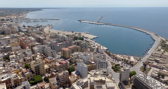 Aerial view of the marina of Marsala, in the province of Trapani, Sicily, Italy. It is a small tourist port overlooking the Mediterranean Sea.
