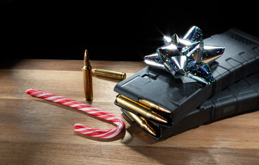 AR-15 magazines and a candy cane on the table