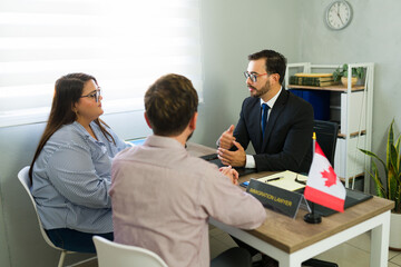 Immigration lawyer providing legal advice to couple