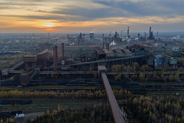 Aerial drone view of Industrial steel factory, iron works. Metallurgical plant. steelworks. Heavy industry in Europe, Poland, Dabrowa Gornicza. Air pollution from chimneys. Ecology and environmental