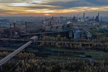 Aerial drone view of Industrial steel factory, iron works. Metallurgical plant. steelworks. Heavy industry in Europe, Poland, Dabrowa Gornicza. Air pollution from chimneys. Ecology and environmental
