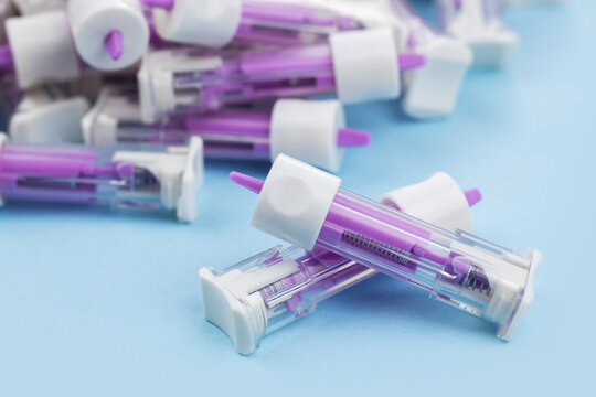 Disposable safety lancets. Automatic lancet scarifier for painless blood sampling. Blood test with a finger. injection of blood