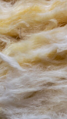 yellow mineral wool with a visible texture