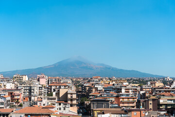Mount Etna Over Catania Rooftops