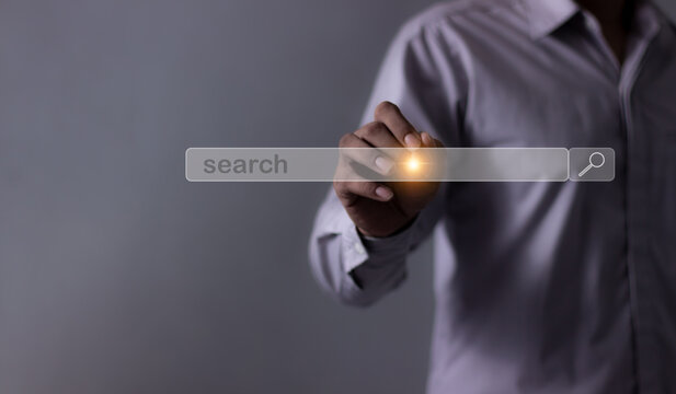 Young man with smartphone mobile hand using a pen touching to search bar, Search job - Powered by Adobe