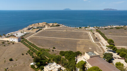 Aerial view of the archaeological site of Lilibeo (Lilybaeum for the Romans), located near Marsala, Sicily, Italy. It was an ancient city towards Cape Boeo and in the background are the Egadi Islands.