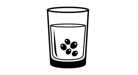 A glass of water with several small, dark, round objects at the bottom.