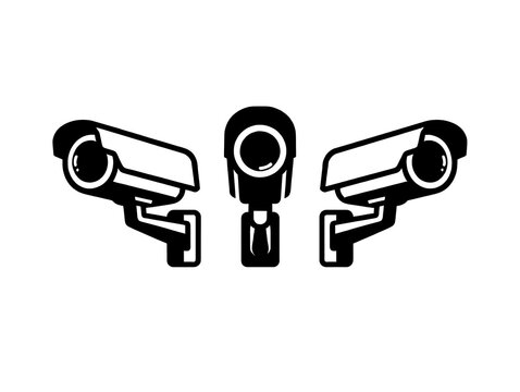 Three black and white security cameras in a row for surveillance and monitoring
