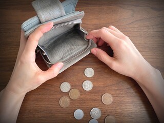 No money in wallet – concept of living cost, debt and budget problems