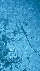 blue old aluminum sheet with burnt marks from the pan