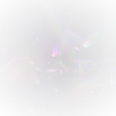 Iridescent crystal light leaks form sparkling rainbow streaks with soft glowing edges. Lens flare...