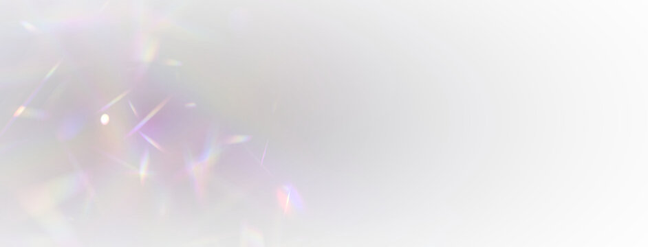 Rainbow crystal streaks shimmer like flowing light across a dark scene. Lens flare and glowing particles enhance magical depth. Ideal for digital overlays and posters. PNG