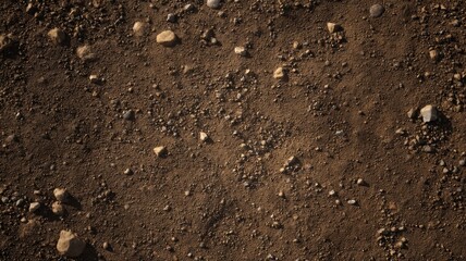 Rugged earthy terrain with rock scatter. AI image