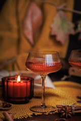 Elegant Autumn Rose Wine Scene with Candle