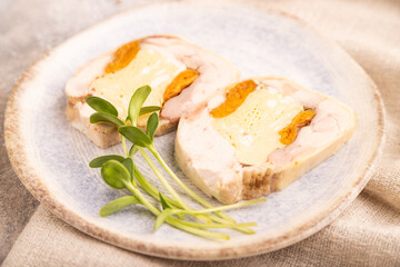 Chicken, egg and dried apricot meatloaf on brown concrete. Diet, healthy eating. side view, selective focus