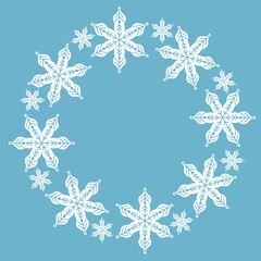 Elegant winter snowflake wreath design with intricate white snow crystals arranged in a circular frame on a blue background, perfect for Christmas cards, winter invitations, and festive decorations.