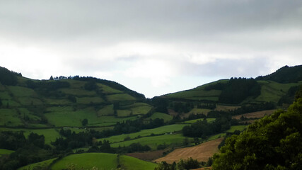 Typical landscape of Sao Miguel Island. Green Hills and rainy weather.