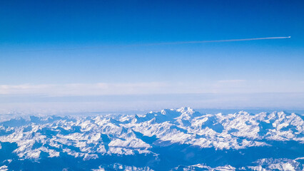 The Alps seen from an airplane window.