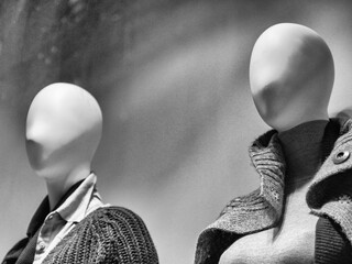 Mannequins in a black and white shop window