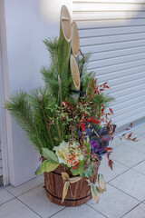 Unique mix of bamboo and pine forms traditional Japanese kadomatsu arrangement base with colorful Japanese sarcandra and kale added into seasonal welcoming decoration for additional flavor.
