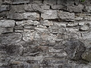 Background of very old stone wall texture photo