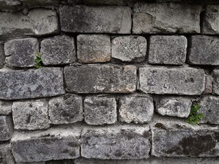 Background of very old stone wall texture photo
