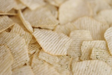 Homemade Flavored Paprika Potato Chips in a Bowl, top view. Flat lay