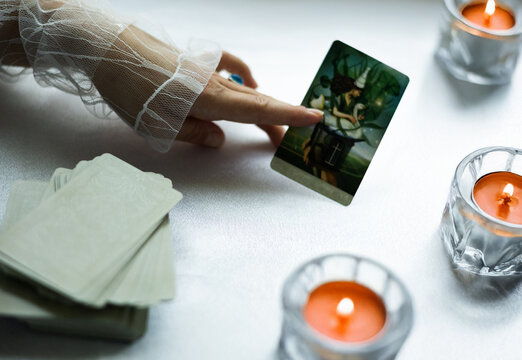The tarot reader is doing a reading